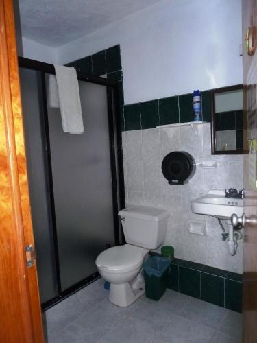Foto del baño de Amigos Hostel Cozumel