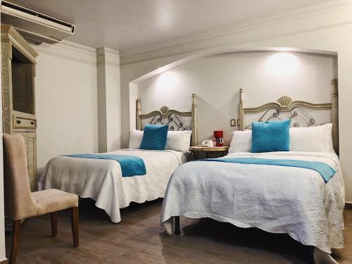 Foto de una habitación de Hotel Casa de los Angel&amp;#039;s