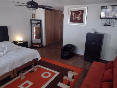 Foto de una habitación de Hotel Leyenda del Tepozteco