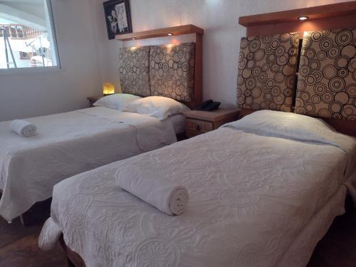 Foto de una habitación de Hotel Leyenda del Tepozteco