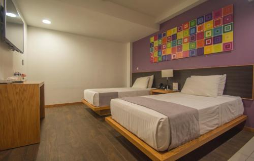 Foto de una habitación de Concept Hotel