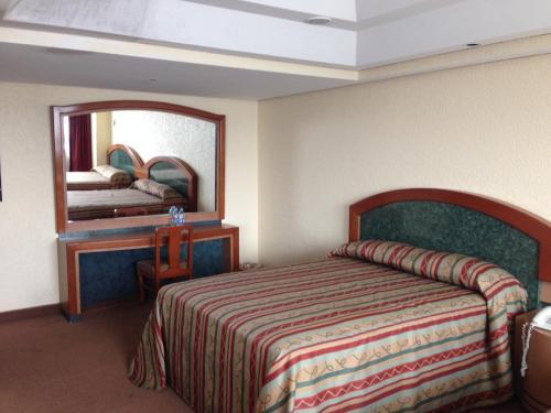 Foto de una habitación de Hotel Torremolinos