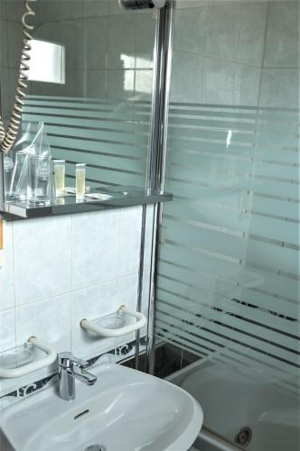 Foto del baño de Hotel Consul