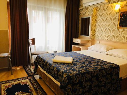 Foto de una habitación de Hamit Hotel