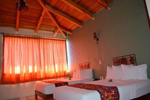 Foto de una habitación de Hotel Aldama