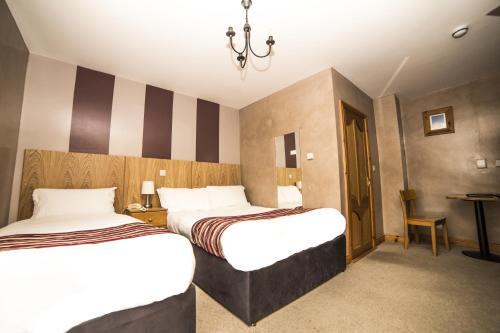 Foto de una habitación de The Frontier Hotel