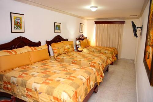 Foto de una habitación de Hotel Los Jardines