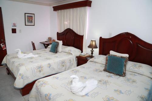 Foto de una habitación de Hotel Los Jardines