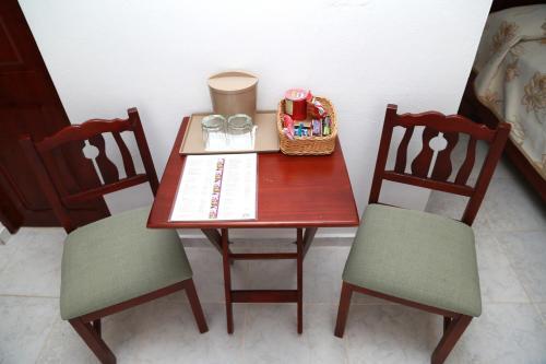 Foto de una habitación de Hotel Los Jardines