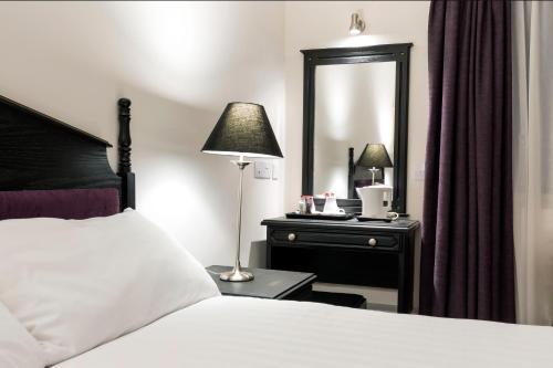 Foto de una habitación de Ivy Tower Hotel