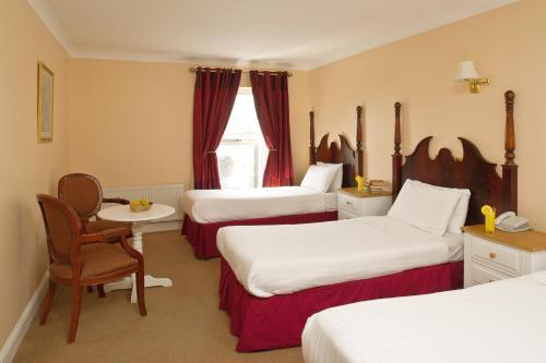 Foto de una habitación de Shamrock Inn Hotel