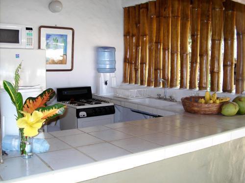 Foto de una habitación de Junto al Rio Bungalows &amp;amp; Suites