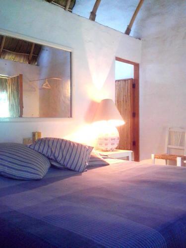 Foto de una habitación de Junto al Rio Bungalows &amp;amp; Suites