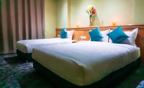 Foto de una habitación de Hotel Golden Flora