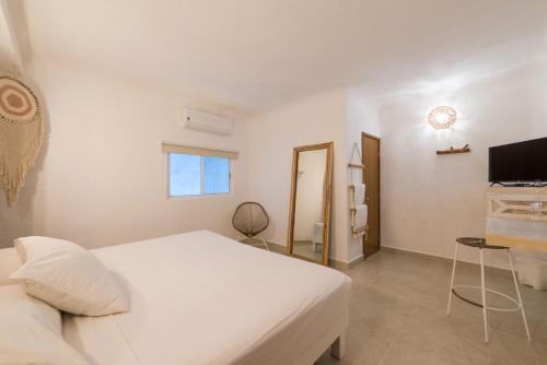 Foto de una habitación de Hotel Caracol Puerto