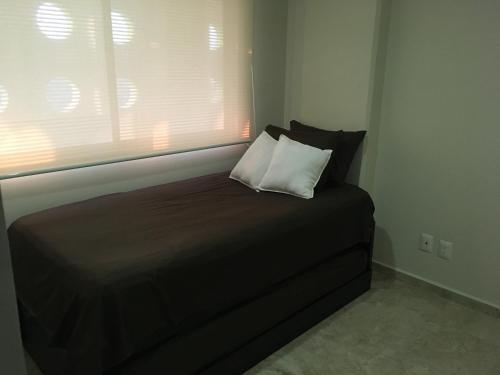 Foto de una habitación de Alquileres Vacacionales Departamento en Acapulco Diamante
