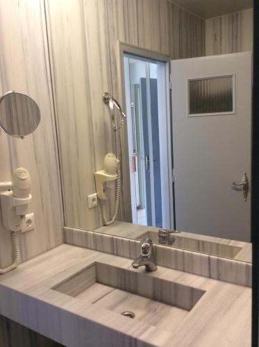 Foto del baño de Apartamentos Sailinn Mykonos
