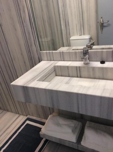 Foto del baño de Apartamentos Sailinn Mykonos