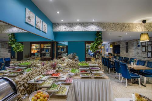 Foto de restauración de Raymond Blue Hotel