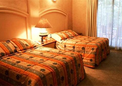 Foto de una habitación de Hotel Hacienda Cola del Caballo