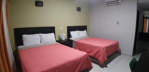 Foto de una habitación de Hotel Playa Victoria