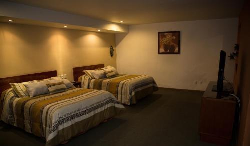 Foto de una habitación de Hotel La Loma