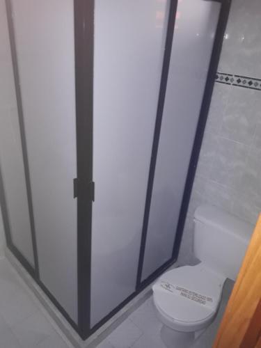 Foto del baño de Hotel Tres Flores