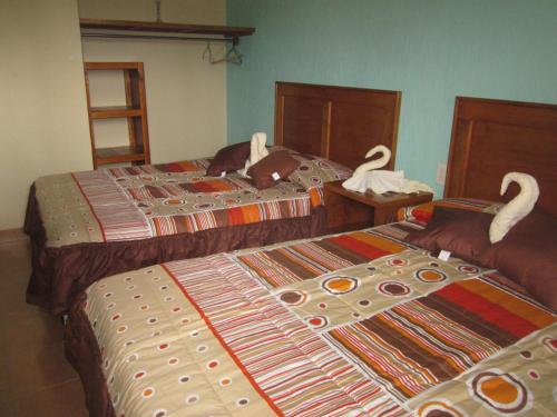 Foto de una habitación de Hotel Tres Flores