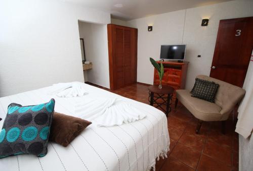 Foto de una habitación de Villa Blanca Suites