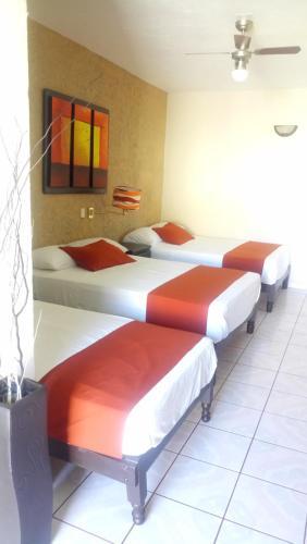 Foto de una habitación de Hotel Brambila