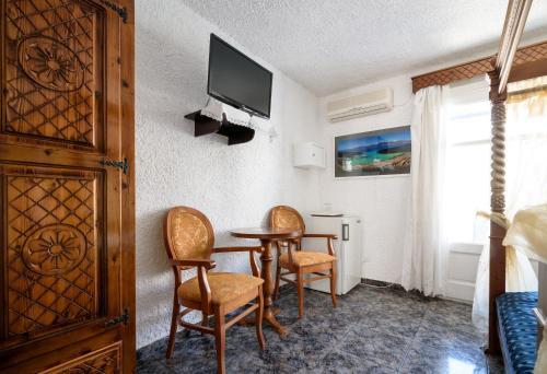 Foto de una habitación de Hotel Porto Perissa