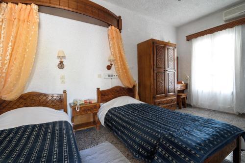 Foto de una habitación de Hotel Porto Perissa