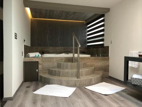 Foto de una habitación de Kaia Suites