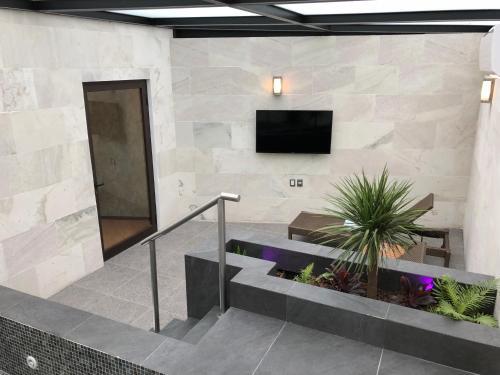 Foto de una habitación de Kaia Suites
