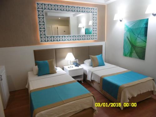 Foto de una habitación de Nasa Flora Hotel