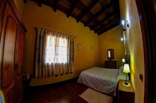 Foto de una habitación de Apartamentos Finca La Bonita