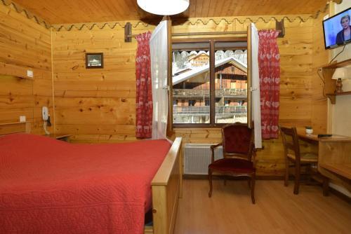 Foto de una habitación de Hotel Le Ferraillon