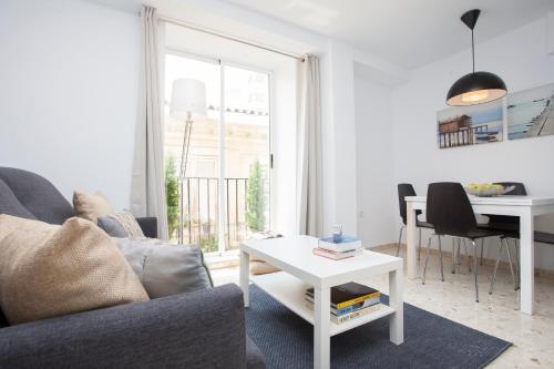 Foto de una habitación de Apartamentos SingularStays Mercado Central