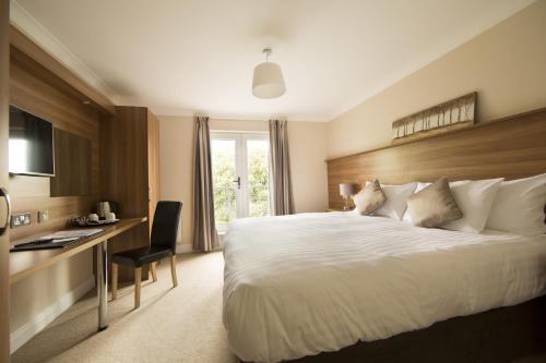 Foto de una habitación de Riverside Hotel