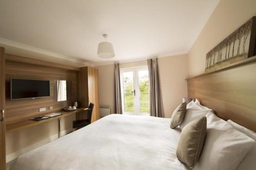 Foto de una habitación de Riverside Hotel