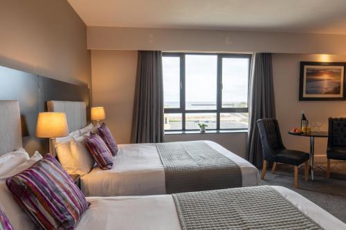 Foto de una habitación de Ocean Sands Hotel
