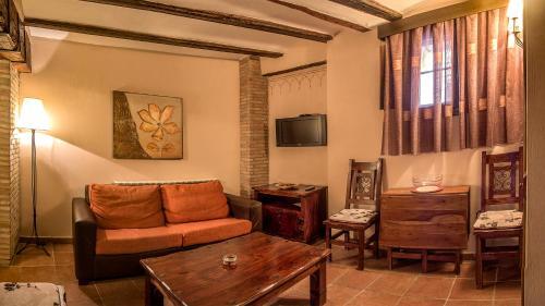 Foto de una habitación de Apartamentos los Aljezares