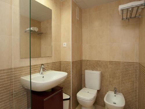 Foto del baño de Apartamentos For A Stay Las Dunas