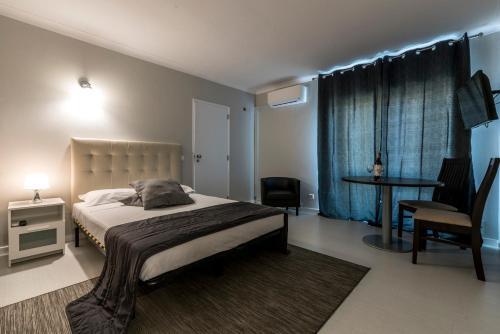 Foto del baño de Lagos Village
