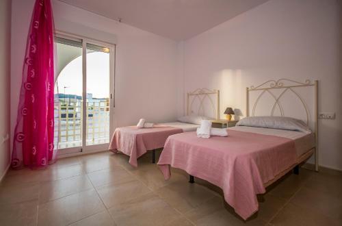 Foto de una habitación de Apartamentos Turisticos Zahazar