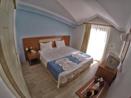 Foto de una habitación de Kas Bilgin Hotel