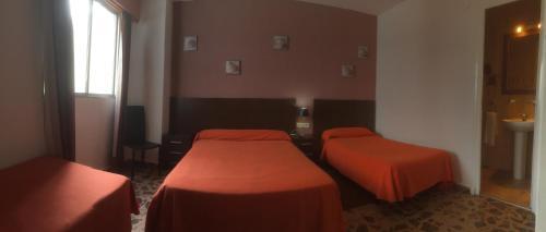 Foto de una habitación de Hotel Nou Rocamar
