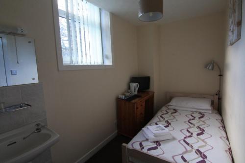 Foto de una habitación de Hampton Court Guesthouse