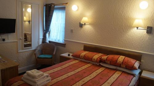 Foto de una habitación de Hampton Court Guesthouse