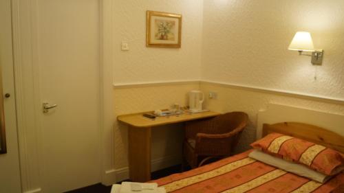 Foto de una habitación de Hampton Court Guesthouse